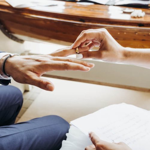 Couple meeting with a legal professional to discuss property rights and home ownership, representing common-law relationships and family property laws with guidance from TLR Law in Manitoba.