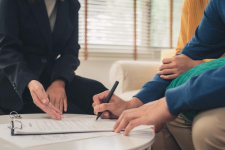 Legal professional guiding clients through estate paperwork, representing probate applications and executor responsibilities in Manitoba with support from TLR Law.